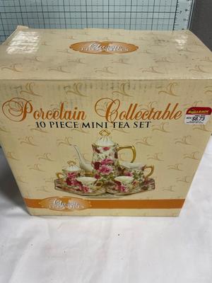 Porcelain mini tea set with angel