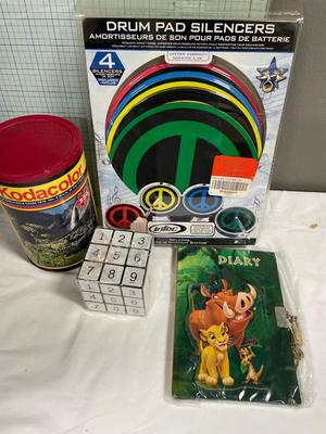Miscellaneous toys, including vintage puzzle, diary, drum pads