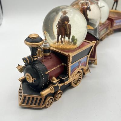 LOT 211K: Bradford Exchange John Wayne Express Water Globe Train Set