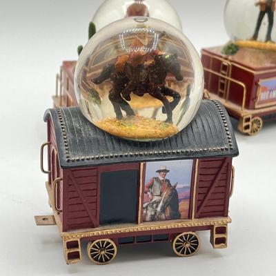 LOT 211K: Bradford Exchange John Wayne Express Water Globe Train Set