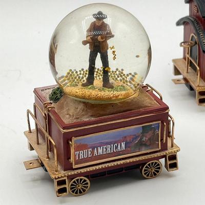 LOT 211K: Bradford Exchange John Wayne Express Water Globe Train Set