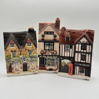 LOT 213K: Hazle Ceramics Nation of Shopkeepers Wall Plaques