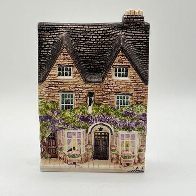 LOT 215K: Hazle Ceramics Nation of Shopkeepers Wall Plaques