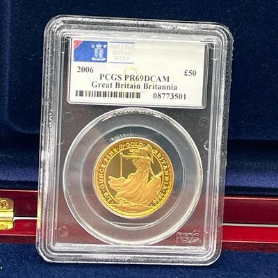 LOT 221: 2006 Deluxe Britannia Collection - Gold Proof Four Coin Set - 1.85 Ounces of Gold