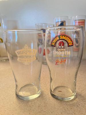 LOT 234K: Big Lot Of Beer Glasses and Bar Towels