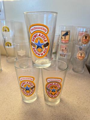 LOT 234K: Big Lot Of Beer Glasses and Bar Towels