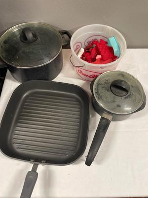 Two revere wear pots and pampered chef griddle pan with cookie cutters