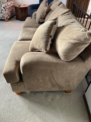 Tan fabric sofa by Hughes Furniture