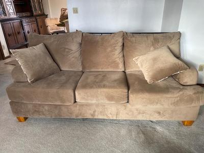 Tan fabric sofa by Hughes Furniture