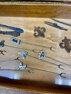 VIntage Odds and Ends Lot - Misc Pieces - 2 small silver plate spoons, 2 copper pendants, picks, etc inside box