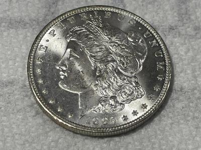1885-O CHOICE BU BRIGHT WHITE MORGAN SILVER DOLLAR AS PICTURED. FREE DOMESTIC SHIPPING.
