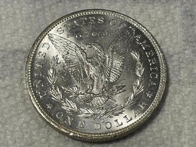 1885-O CHOICE BU BRIGHT WHITE MORGAN SILVER DOLLAR AS PICTURED. FREE DOMESTIC SHIPPING.
