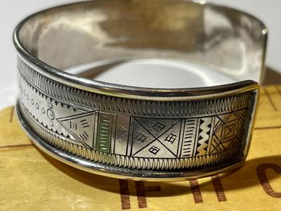Vintage Sterling Silver Tuareg Etched Cuff Bangle Bracelet for a Standard Size 7" Wrist in Good Preowned Condition.
