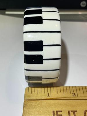 Vintage Lucite Piano Keys Bangle Bracelet 1.25" Wide & Standard 7" Wrist Size in VG Preowned Condition.