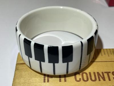 Vintage Lucite Piano Keys Bangle Bracelet 1.25" Wide & Standard 7" Wrist Size in VG Preowned Condition.