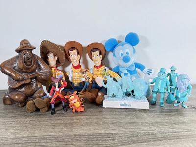 LOT 45L: Disney Collection - 1970s Big Al Coin Bank, Woody Dolls, Hallmark Haunted Mansion Hitch Hiking Ghosts & More