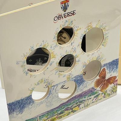 LOT 169J: Five United Kingdom Brilliant Uncirculated Coin Sets - 1984, 1986, 1989-'91