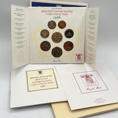 LOT 169J: Five United Kingdom Brilliant Uncirculated Coin Sets - 1984, 1986, 1989-'91