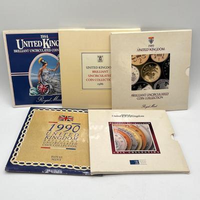 LOT 169J: Five United Kingdom Brilliant Uncirculated Coin Sets - 1984, 1986, 1989-'91