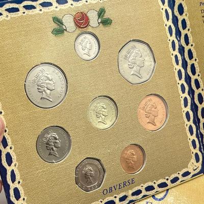LOT 169J: Five United Kingdom Brilliant Uncirculated Coin Sets - 1984, 1986, 1989-'91