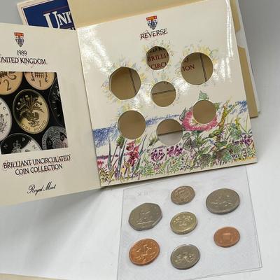 LOT 169J: Five United Kingdom Brilliant Uncirculated Coin Sets - 1984, 1986, 1989-'91
