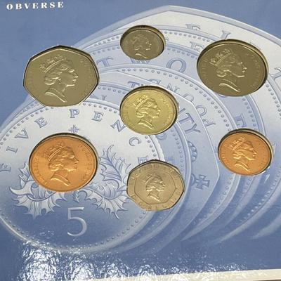 LOT 169J: Five United Kingdom Brilliant Uncirculated Coin Sets - 1984, 1986, 1989-'91