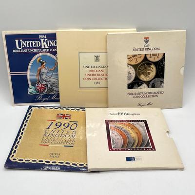 LOT 169J: Five United Kingdom Brilliant Uncirculated Coin Sets - 1984, 1986, 1989-'91