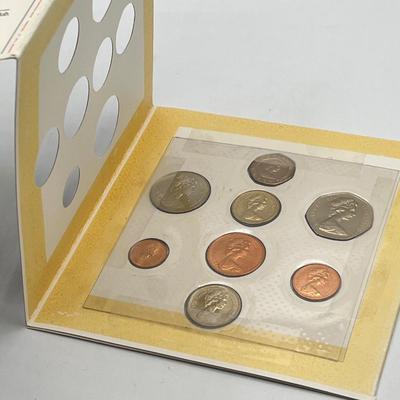 LOT 169J: Five United Kingdom Brilliant Uncirculated Coin Sets - 1984, 1986, 1989-'91