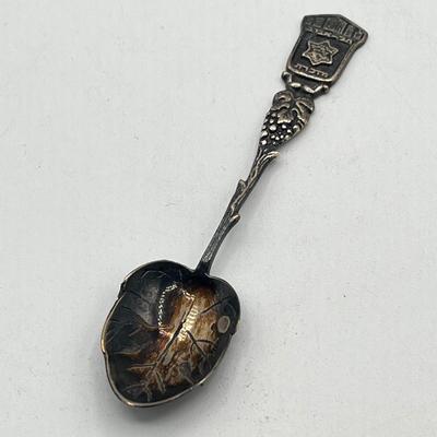 LOT 172J: Silver Lot - Fisher Sterling Candle Holder - 28 grams, and Judaica Souvenir Leaf Spoon - .835 Silver - 13.6 grams