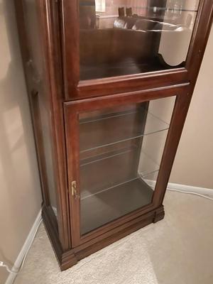 Curio cabinet. 28”w x 13.5d x 73.5h