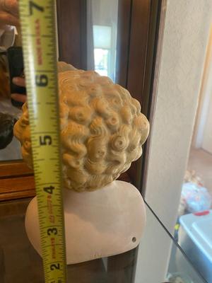 ANTIQUE DOLL HEADS AND LIMBS