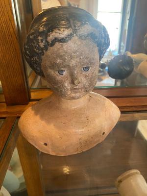 ANTIQUE DOLL HEADS AND LIMBS
