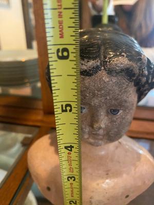 ANTIQUE DOLL HEADS AND LIMBS