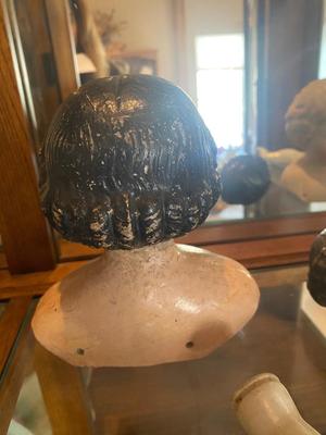 ANTIQUE DOLL HEADS AND LIMBS