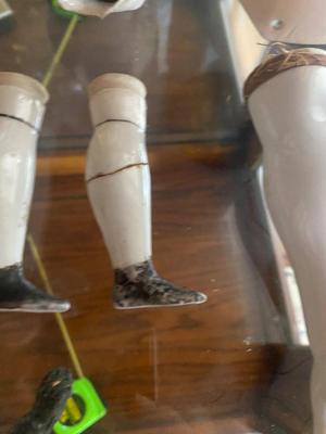 ANTIQUE DOLL HEADS AND LIMBS