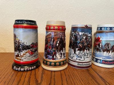 ARRAY OF BUDWEISER STEINS