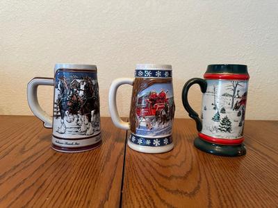 ARRAY OF BUDWEISER STEINS