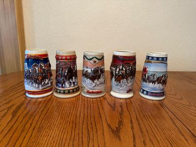 ARRAY OF BUDWEISER STEINS