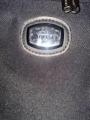 DELSEY SUITCASE AND NEAT CARRY ON THAT DOUBLES AS A BRIEFCASE