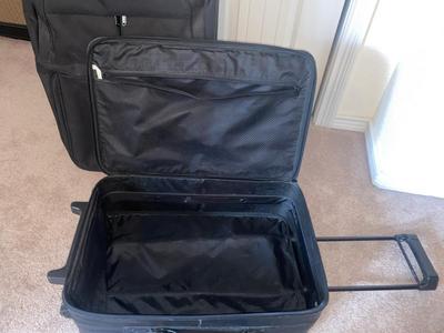 DELSEY SUITCASE AND NEAT CARRY ON THAT DOUBLES AS A BRIEFCASE