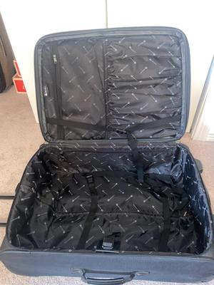 DELSEY SUITCASE AND NEAT CARRY ON THAT DOUBLES AS A BRIEFCASE