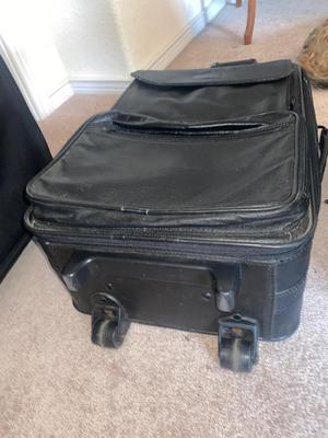 DELSEY SUITCASE AND NEAT CARRY ON THAT DOUBLES AS A BRIEFCASE