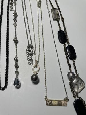 Assorted silver-tone necklaces