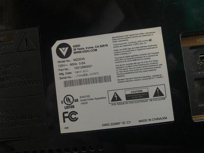 VIZIO 25” TELEVISION AND WALL CLOCK