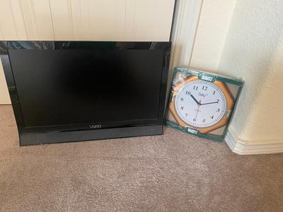 VIZIO 25” TELEVISION AND WALL CLOCK