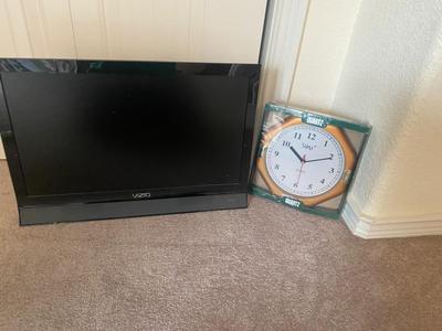VIZIO 25” TELEVISION AND WALL CLOCK
