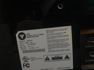 VIZIO 25” TELEVISION AND WALL CLOCK