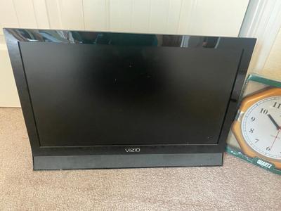 VIZIO 25” TELEVISION AND WALL CLOCK