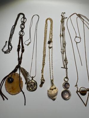 Necklaces with gold-tones