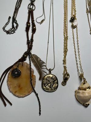 Necklaces with gold-tones